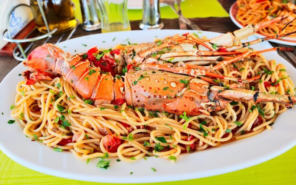 Mediterranean cuisine in Santorini with lobster and pasta