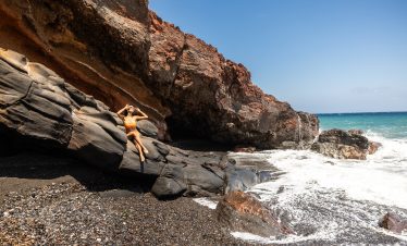 Solo photography at the Black beach of Santorini