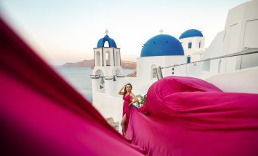 hot pink flying dress photography Santorini