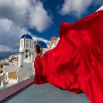 red flying dress Santorini